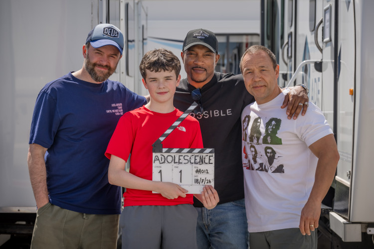 Adolescence*. (L to R) Phillip Barantini, Owen Cooper, Ashley Walters, Stephen Graham on the set of Adolescence. Cr. Courtesy of Netflix/Ben Blackall © 2024 *working title