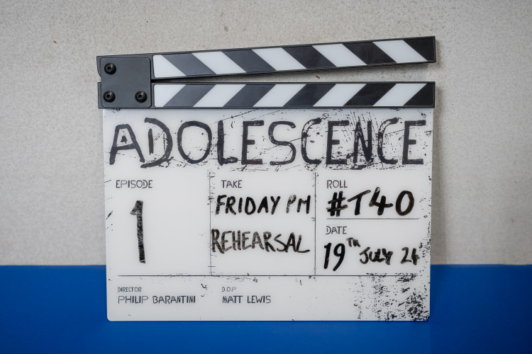 Adolescence*. A clapperboard for Adolescence. Cr. Courtesy of Netflix/Ben Blackall © 2024 *working title